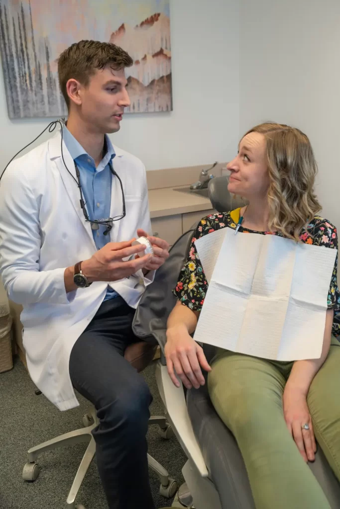 Dr. Robert Geis discussing treatment options with patient.